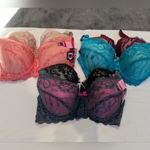 Brand New with Tags 6 pack under wire, padded bras. Size 34 DDD.